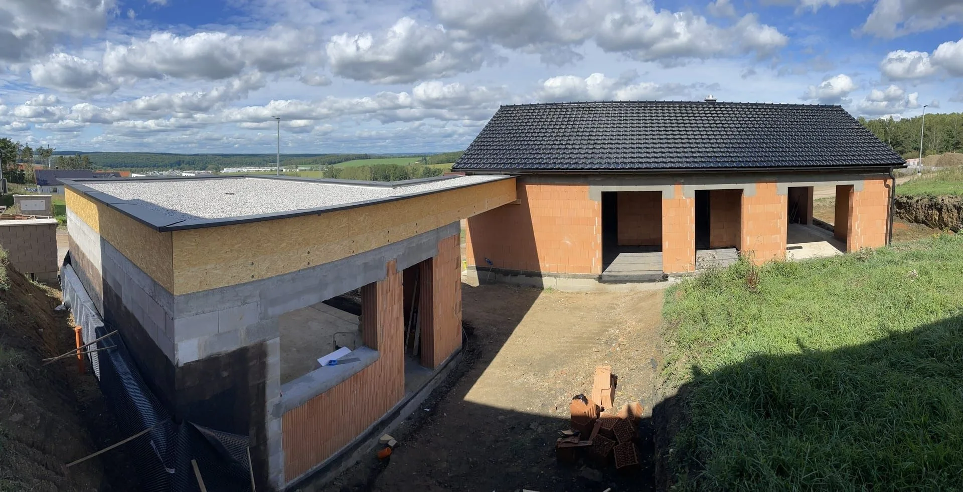 Family house under construction in Holýšov with its roof structure completed