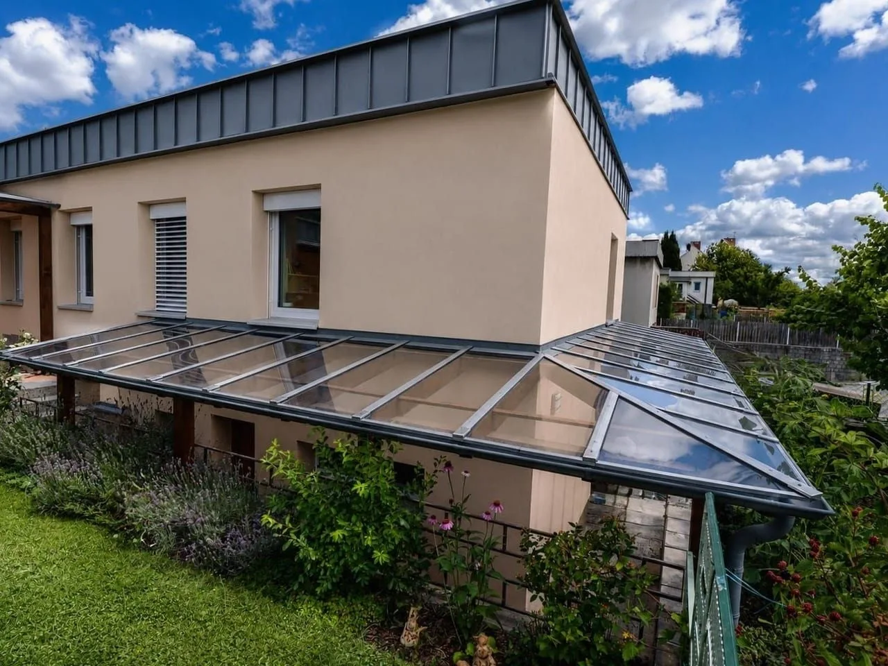 Wide view of the glazed canopy and garden façade
